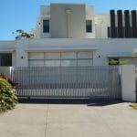 White Large Gate — Garage Door in Maroochydore, QLD